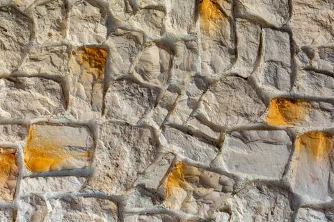 The texture of the stone wall. Background texture of the stone wall of the ol Stock Photos