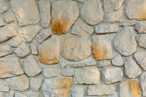 The texture of the stone wall. Background texture of the stone wall of the ol Photos