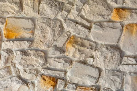 The texture of the stone wall. Background texture of the stone wall of the ol Stock Photos