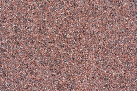 The texture of the stone wall of granite chips Stock Photos