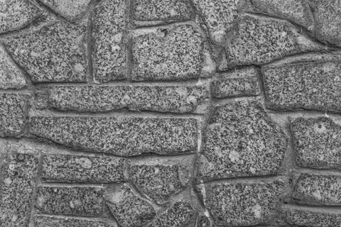 The texture of the stone wall. Granite Stock Photos