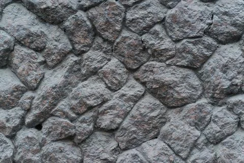 The texture of the stone wall. Granite Stock Photos