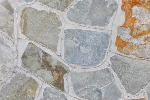 Texture of the stone wall of a house Stock Photos
