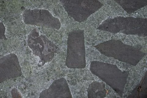 Texture of stone wall made of grey stones Stock Photos