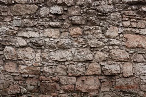 Texture of stone wall with many big brown stones Stock Illustration