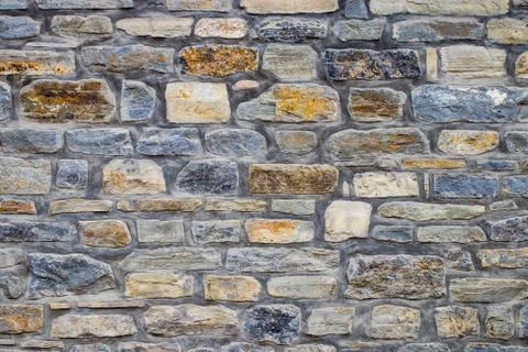 Texture of a stone wall. Old castle stone wall texture background. Stone wall Stock Photos