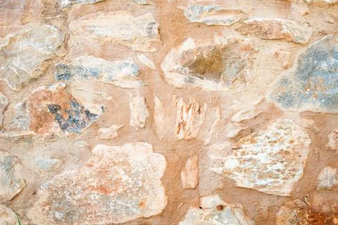 Texture of a stone wall. Old castle stone wall texture background. Briks ston Stock Photos