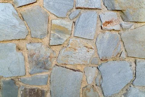 Texture of a stone wall. Old castle stone wall texture background. Stone wall Stock Photos
