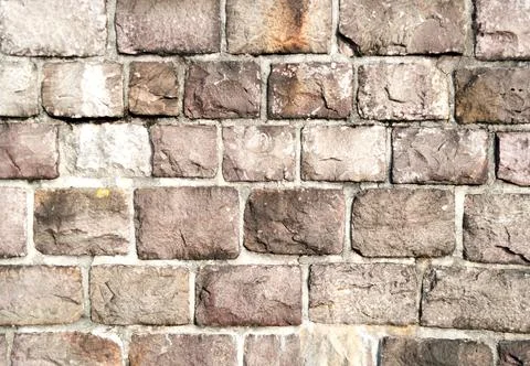 Texture of a stone wall. Old castle stone wall texture background. Part of a Stock Photos