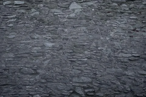 Texture of a stone wall. Old castle stone wall texture background. Stone wall Stock Photos
