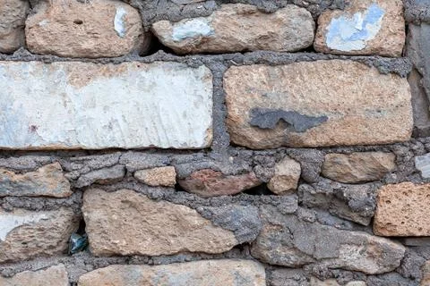 Texture of a stone wall. Old castle stone wall texture background. Stock Photos