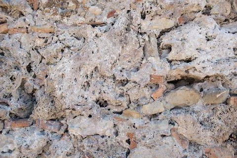 Texture of a stone wall. Old castle stone wall texture background. Stock Photos
