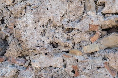 Texture of a stone wall. Old castle stone wall texture background. Stock Photos