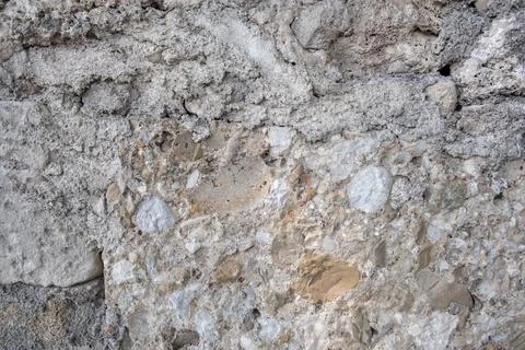 Texture of a stone wall. Old castle stone wall texture background. Stock Photos