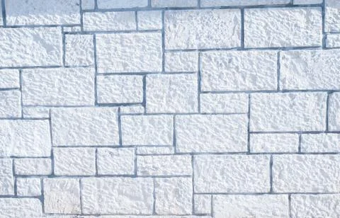 Texture of a stone wall. Old stone wall texture background. Stone wall as a b Stock Photos