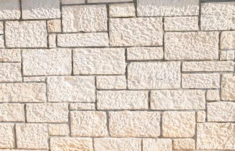 Texture of a stone wall. Old stone wall texture background. Stone wall as a b Stock Photos