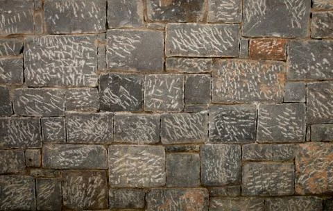 Texture of a stone wall. Old stone wall texture background. Stone wall as a b Stock Photos
