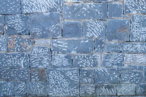 Texture of a stone wall. Old stone wall texture background. Stone wall as a b Stock Photos