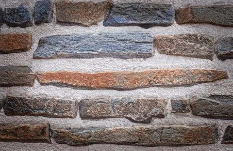 Texture of a stone wall. Pattern of colorful modern style design decorative u Stock Photos