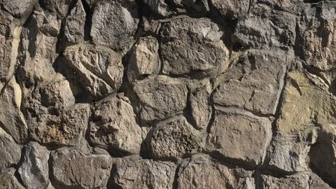 Texture of a stone wall Stock Photos