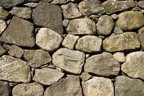 Texture stone wall. Seamless background. Stock Photos