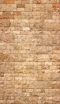 Texture of stone wall, square yellow travertine tile. Stock Photos