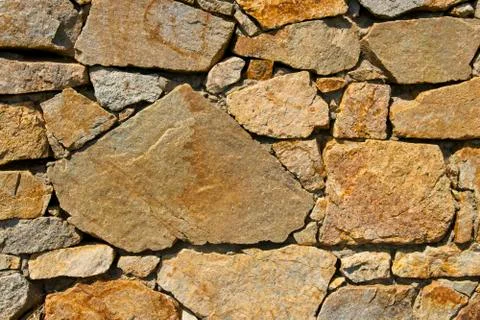 Texture of a stone wall. Textured background of the stone wall of the old cas Foto stock