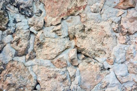 Texture stone yellow-colored clay, paving slabs yellow closeup. Stock Photos