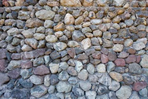 Texture of stones and cobblestones with sharp edges. Stock Photos