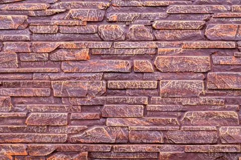 The texture of the stones covered with brown lacquer, can be used as a backgr Stock Photos