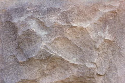 The texture of the stone.Stone brown background. Stock Photos