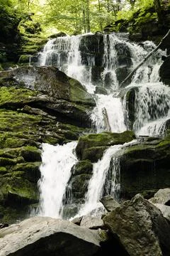 Texture of a stream of water falling down a waterfall 写真素材