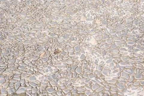 Texture of a street floor. Geometric pattern. Background. Abstract. Copy spac Stock Photos