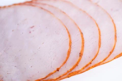 Texture study of sliced ham edges and surface, macro focus captures subtle .. Stock Photos