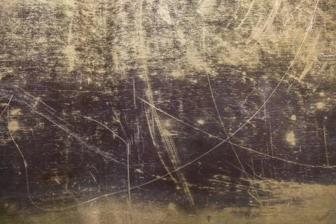 Texture of the surface of the brass leaf, in scratches, background Stock Photos