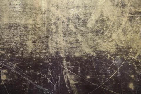 Texture of the surface of the brass leaf, in scratches, background Stock Photos