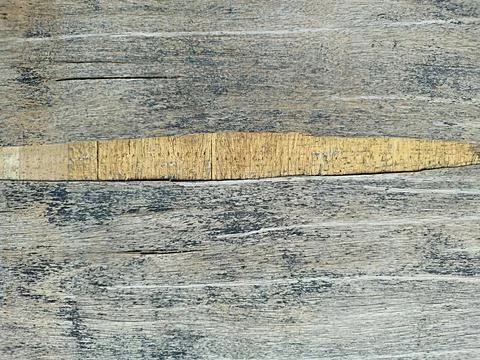 The texture of the surface of a damaged and broken thin board Stock Photos