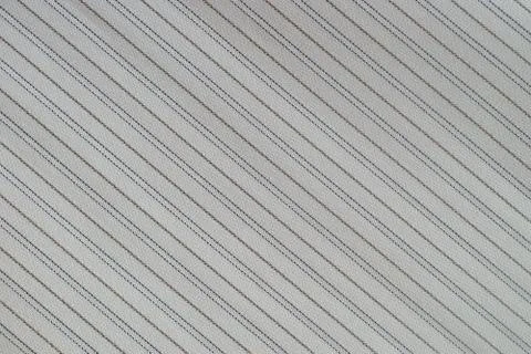 Texture of a surface of a fabric with diagonal lines Stock Photos