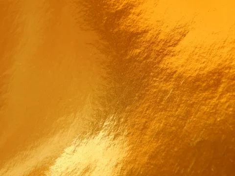 The texture of the surface of the golden background Stock Photos