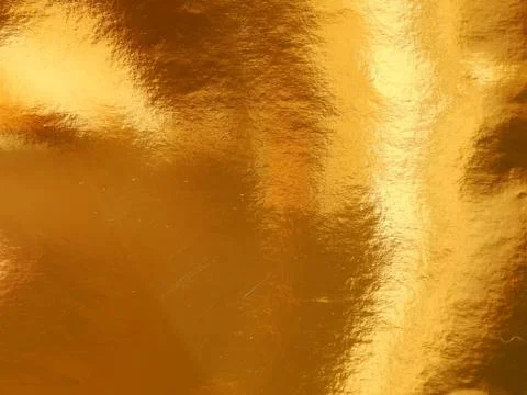 The texture of the surface of the golden background Stock Photos