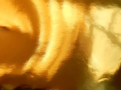 The texture of the surface of the golden background Stock Photos