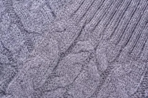 Texture of the surface of a knitted woolen fabric with a pigtail pattern, abs 写真素材