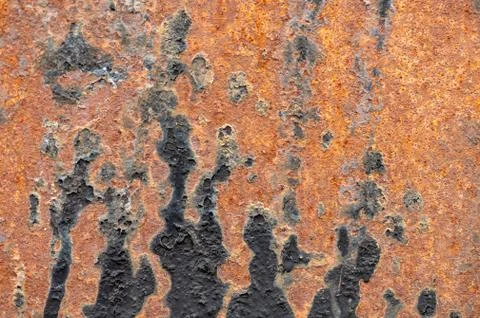Texture of the surface of old iron covered with paint. Close up. Stock Photos