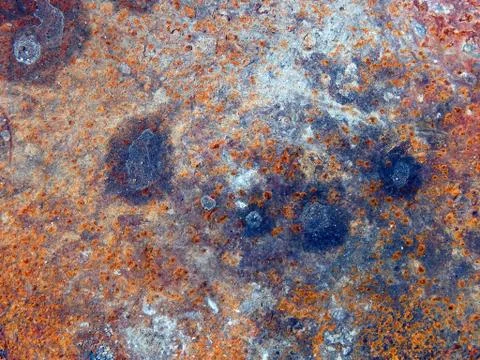 The texture of the surface of rusty iron with shabby paint Stock Photos