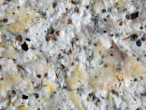 Texture of a surface of silk plaster closeup Stock Photos