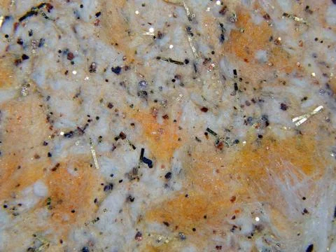 Texture of a surface of silk plaster closeup Stock Photos