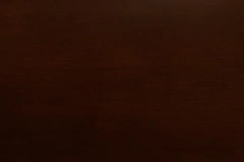 The texture of the table is dark brown with horizontal stripes Stock Photos