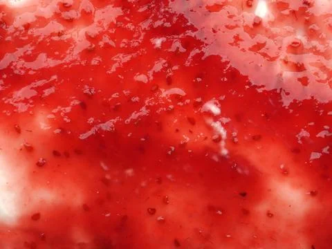 Texture of tasty raspberry jam on fresh organic curd Stock Photos