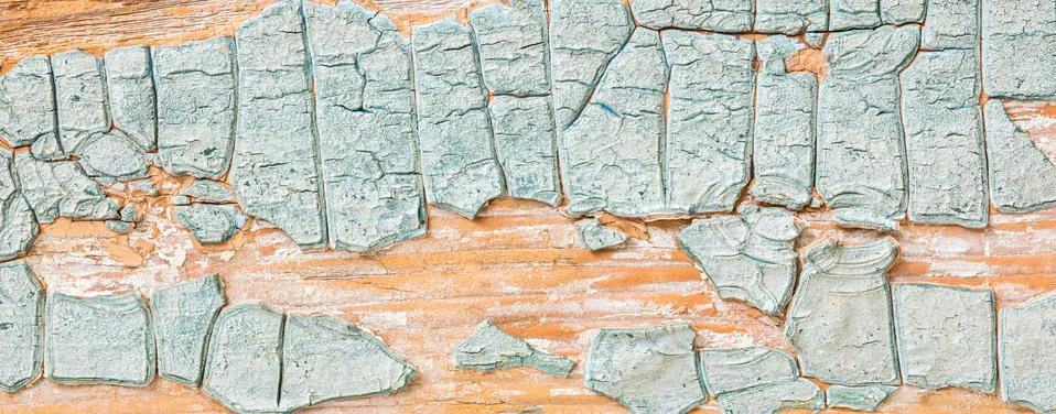 Texture of thick cracked layer of light blue paint on old wood Stock Photos
