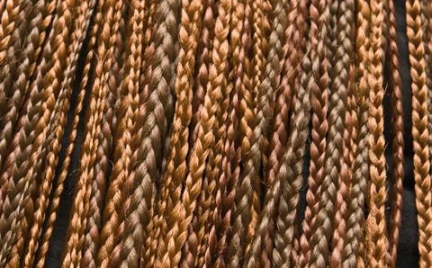 Texture of thin brown pigtails, afro style Stock Photos